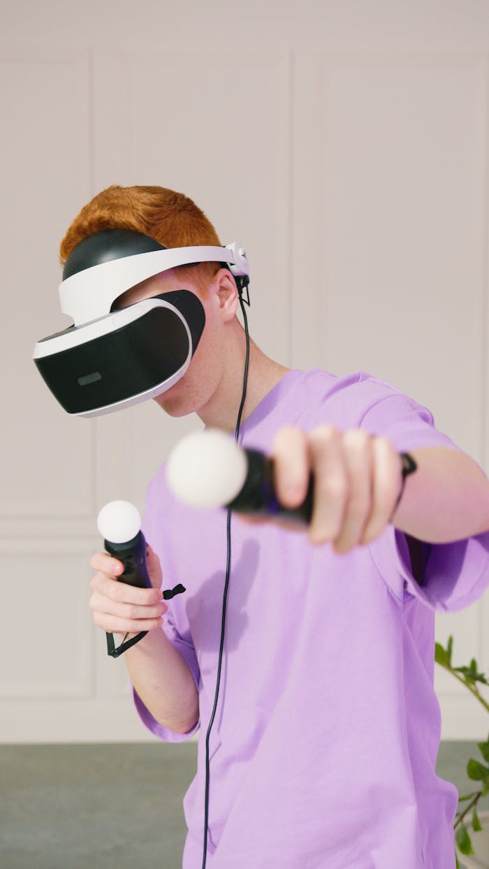 why-choose-us A young man enjoying an immersive virtual reality game indoors with VR headset and controllers.